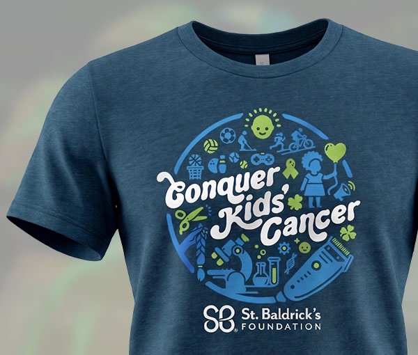 The Conquer Kids' Cancer design printed on a navy tee.